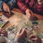 Traveler planning trip abroad with cash, passport, and travel map.