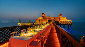 Alt Text: “Pierchic Dubai romantic dining over Arabian Gulf with seafood platter is one of the best retaurants in dubai”