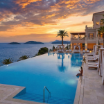 Luxury hotel pool offering premium comfort for less.